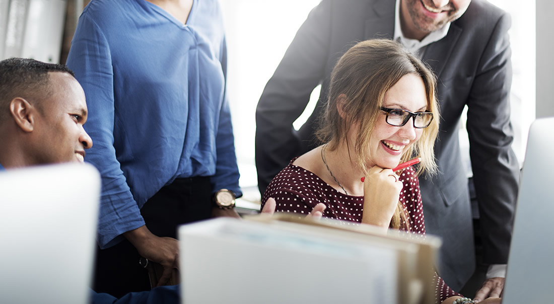 Young office worker laughing